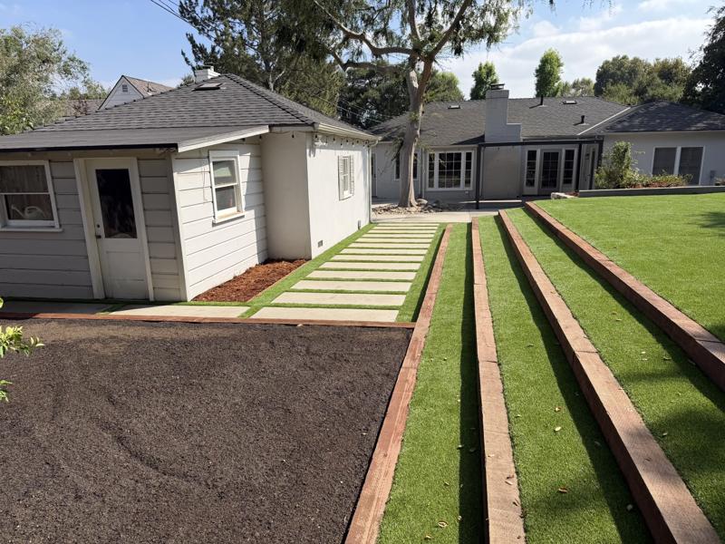 Landscape crew collaborating on a residential project